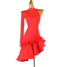 a red dress on a mannequin with long sleeves and ruffled hems