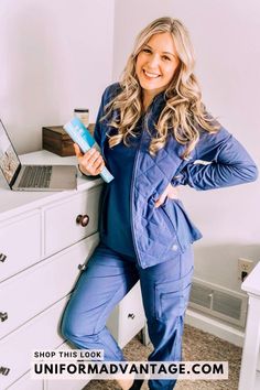 Woman wearing the Easy STRETCH by Butter-Soft™ Chloe V-Neck Tuck-In Scrub Top, the Mila Jogger Scrub Pants, and the Keira Quilted Long Sleeve Scrub Jacket Style Uniform, Scrubs Medical, Scrubs Dress, Nursing Scrubs, Medical Outfit