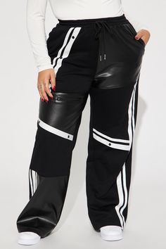 Available In Black/White. Wide Leg Pant Mid Rise Elastic Waistband Drawstring Stripes Detail French Terry Side Pockets Faux Leather Contrast Stretch Shell 1 Coating 100% PU Shell 1 Ground 100% Polyester Shell 2 85% Cotton 15% Polyester Imported | Private Landing Striped Track Pant in Black/White size 2X by Fashion Nova Shifting Closet, Striped Pant, Track Pant, Wide Leg Pant, Black White Fashion, Jeans Jumpsuit, Matching Dresses, Track Pants, French Terry