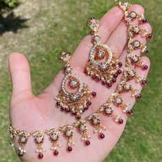 dainty necklace set Hand Set Red Kundan Ruby Necklace, Jadau Sets, Jadau Pendant Set, Jadau Set, Festive Red Gold-plated Kundan Necklace, Jadau Three Piece Necklace, 22k Gold Jewelry Necklaces, Pearl Bangle Bracelet, 22k Gold Jewelry