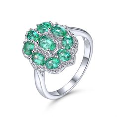 Limited time price. The round emerald stones are very clear, and the color is dark green. Very high-quality silver finish, it does not tarnish.  The diamond is SI1 clarity and G color. All out Emeralds originate from Zambia. Silver 3.80g. Emerald 1.867ct. Diamond 0.036ct. Size #8 Diamond Engagement Band, Bold Rings, Engagement Band, Emerald Engagement, Engagement Bands, Emerald Stone, Emerald Gemstone, Zambia, Sterling Silver Bands