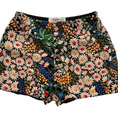 Black And Multicolor Valentino Mid-Rise Mini Shorts With Floral Embroidery Throughout And Zip Closure At Side. Waist: 26" Hip: 36" Rise: 10" Inseam: 2" Leg Opening: 22" Fabric: 91% Silk, 9% Elastane; Lining 2 100% Silk Hand Wash Only Excellent Condition Multicolor Floral Embroidered Bottoms For Spring, Spring Multicolor Floral Embroidered Bottoms, Spring Embroidered Multicolor Bottoms, Embroidered Multicolor Bottoms For Summer, Summer Embroidered Multicolor Bottoms, Embroidered Multicolor Summer Bottoms, Fitted Multicolor Bottoms With Floral Embroidery, Womens Tweed, Vintage Valentino