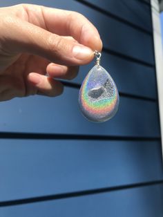 These holographic Teardrop geode earrings made from resin shift from clear to a beautiful sparkly rainbow. They are lightweight and won't bother your ears. Made by Katie Glover Resin Art by Katie 2020 Contact me on my Instagram @123pour if you would like additional photos or videos of this product.Please be aware that this is handmade art and perfection has no place in art. However, this was crafted with love and intention and I hope you are satisfied with your purchase. Your purchase is not ref Geode Earrings, Druzy Agate, Handmade Art, Resin Art, Druzy, Mother’s Day, Hippie Boho, Crochet Earrings, Dangle Drop Earrings