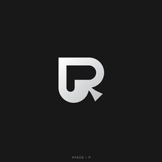 the letter r is made up of white and black letters on a black background with an arrow