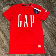 Gap Tshirt Size: Small Trendy Gap Cotton T-shirt, Gap T-shirt With Letter Print For Streetwear, Sporty Crew Neck Tops By Gap, Sporty Cotton Tops By Gap, Sporty Crew Neck Tops From Gap, Trendy Red T-shirt With Text Print, Gap Cotton Tops With Logo Print, Trendy Cotton Gap T-shirt, Sporty Letter Print Tops By Gap