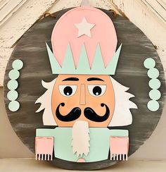 a wooden sign with a cartoon character wearing a crown and holding a comb in his hand