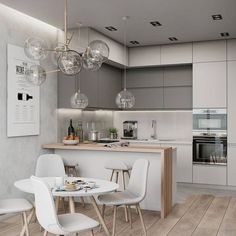 a modern kitchen with an island table and white chairs