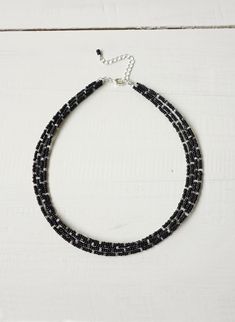 Black beaded layered choker necklace, small seed beads. Black Faceted Beads Choker, Adjustable Double Strand Black Beaded Necklace, Silver Multi-strand Beaded Necklace With Black Beads, Adjustable Black Multi-strand Beaded Necklaces, Black Multi-strand Necklace With Silver Beads, Black Tiny Beads Choker Necklace, Adjustable Black Choker With Tiny Beads, Black Beaded Chain Choker With Round Beads, Black Beaded Choker Necklace