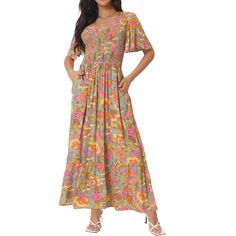 A floral maxi dress featuring a round neckline, short sleeves, and a shirred waist with a flowy silhouette. The semi-loose cut of this dress paired will quickly make this dress a favorite! This color is 100% Rayon, for a better dress experience, suggest ironing it low before wearing it! Enjoy all of the compliments in this bohemian maxi dress! Great for casual, work, beach, date, party, honeymoon, holiday, family gatherings and photoshoots, etc. Multicolor Maxi Dress With Elastic Waistband For Summer, Elegant Multicolor Maxi Dress With Elastic Waistband, Short Sleeve Maxi Dress With Gathered Waist For Spring, Spring Maxi Dress With Gathered Waist And Short Sleeves, Bohemian Smocked Short Sleeve Dress With Floral Print, Bohemian Smocked Dress With Short Sleeves And Floral Print, Bohemian Smocked Dress With Floral Print And Short Sleeves, Multicolor Smocked Dress With Short Sleeves, Casual Maxi Dress With Floral Print And Flutter Sleeves