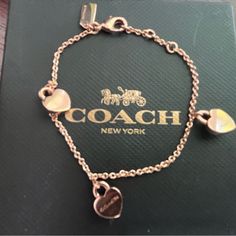 I Am In The Midst Of Simplifying My Closet/Wardrobe. I Am Selling A Rosegold Twinkling Heart Bracelet By Coach. It’s In Mint Condition, With Tags Attached, And Has Been Preserved In The Original Box. I Will Also Consider Offers. Coach Jewelry Bracelet Gift, Everyday Gold Coach Jewelry, Coach Bracelet Jewelry Gift, Coach Rose Gold Jewelry For Gifts, Elegant Rose Gold Heart Metal Bracelet, Coach Heart Charm Jewelry, Coach Heart Charm Heart Jewelry, Elegant Coach Bracelets As Gift, Elegant Coach Bracelets For Gift