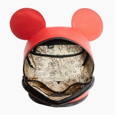 Details Pack it up with our Disney Baby x FP Mickey Anaheim Crossbody! The spacious main compartment allows you to pack all the essentials for quick outing with the kids. The unique shape featuring Disney Mickey's iconic ears are featured front and center and make it one of a kind. Shop our Disney Baby Collection here. Please allow 1-7 days for this item to ship! Features Vegan saffiano leather 100% spill resistant interior and exterior Metal feet so bottom of bag does not touch ground Soft twil Disney Mickey Mouse Backpack For Travel, Disney Mickey Mouse Backpack, Mickey Mouse Bag, Key Clip, Anaheim, Baby Disney, Metallic Logo, Disney Mickey, Fashion Backpack