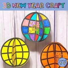 three colorful paper balls hanging from strings with the words happy new year craft on them