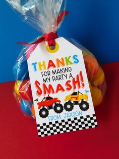 there is a bag of candy with a tag on it that says thanks for making my party a smash