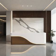 an elegant reception area with marble and wood accents