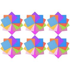 many different colored papers are arranged in the shape of hexagons on a white background