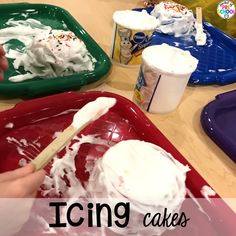 someone is painting icing on a red tray