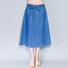 Vintage Blue Midi Wrap Skirt Jean Skirt By Levi's. Waist Tie. Size Waist 34 = L/Xl. Length Appx 29". Condition: New With Tags Attached/ Deadstock Material: 65% Cotton, 35% Polyester Stretch: No Pockets: Yes Lined: No Instagram @Fashionwithouttrashin Model: Height 5’8” Bust 34b Waist 27” Hips 35" Smoke-Free Minimal Packaging Photos Ornamental Stone Llc 2022 Tags: Classic, Cute, Flattering, Summer, Spring, Fall, Date, Party, High-Rise, Jean, High Waist, Tiktok, Designer, Flared, Tiktok Tik Tok, Ra Summer Denim Knee-length Skirt, Knee-length Blue Denim Skirt For Summer, Spring Knee-length Lined Denim Skirt, Blue Knee-length Denim Skirt For Summer, Spring Knee-length Denim Blue Skirt, Denim Blue Midi Denim Skirt For Summer, Denim Blue Midi Length Skirt For Summer, Trendy Spring Denim Midi Skirt, Chic Denim Skirt For Spring