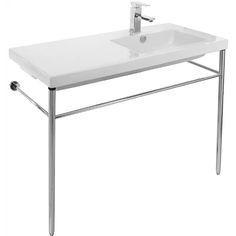 a white bathroom sink sitting under a faucet next to a metal frame counter