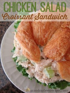 chicken salad on croissant sandwich with lettuce