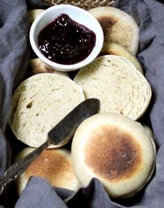 an assortment of breads with jam in a bowl