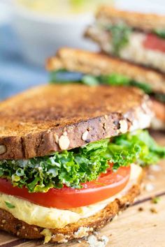 This amazing vegan grilled cheese sandwich is layered with homemade vegan melty cheese, tomato, kale (or spinach), and creamy easy-to-make mayo. Who says grilled cheeses are for kids? This flavorful vegan sandwich is for everyone! #vegangrilledcheese #vegansandwich