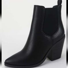 Say Hello To The Perfect Pointed Bootie! These All Black Vegan Leather Booties Feature A Sturdy Chunky Heel With An Elastic Slip On Ankle. Wear These With Your Favorite Pair Of Ankle Jeans , Shorts, Skirt And Dress! Fit: Runs True To Size Wide Feet Size Up Elastic Sides 2.5 Wedge Heel Pull On Booties Chunky Heels Pull Loop On Back Pointed Toe Casual Black Heeled Boots With Pointed Toe, Black Pointed Toe Heeled Boots With Heel Pull Tab, Black Casual Booties With Pointed Toe, Casual Black Pointed Toe Booties, Black Pointed Toe Synthetic Booties, Black Synthetic Pointed Toe Booties, Black Synthetic Booties Medium Width, Casual Black Block Heel Booties, Casual Black Booties With Block Heel