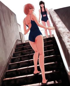 two women in swimsuits walking up some stairs with their backs to the camera