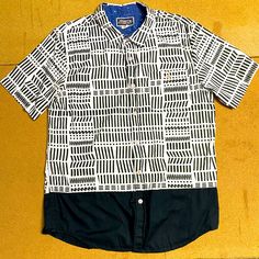 Great Black/White Graphic Print Casual Button Down Short Sleeve Cotton Shirt, For All Your Cargo Shorts, Grey Jeans Or Dark Chinos. Chest 44 Waist 42 Shldr2shldr 22 Neck 18 Length 29 Condition: 9/10; Excellent Used Condition; No Obvious Wear Or Flaws, Just (-1) For Having Been Lightly Worn, Properly Laundered And Steam Ironed, To Near Nwot Condition. White Cotton T-shirt With Button Closure, Printed White Cotton Camp Shirt, White Printed Cotton Camp Shirt, Casual Graphic Print Button-up Shirt, Cotton Graphic Print Button-up Shirt, Fitted White Printed Camp Shirt, Fitted Casual Camp Shirt With Graphic Print, White Collared Short Sleeve Shirt For Streetwear, White Printed Button-up Tops