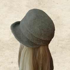 "This felted wool cloche hat is very warm. It's perfect to wear in fall/winter seasons. The hat is lightweight and easy to wear. It's well match with any outfits. One size fits most an average women's head (21.5\" - 22.5\") Composition: 100% Wool Hand wash in cold water and lay flat to dry. Do not use a dryer! NOTE Actual color may slightly different depending on your monitor. Please contact us if you have any questions for the color." Classic Winter Cloche Felt Hat, Classic Cloche Felt Hat For Winter, Fitted Wool Cloche Hat, Winter Wool Wide Brim Top Hat, Wool Wide Brim Top Hat For Winter, Winter Wide Brim Wool Top Hat, Fitted Wool Cloche Hat With Curved Brim, Fall Fur Felt Cloche Hat, Adjustable Brimmed Wool Cloche Hat