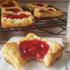 several pastries are cooling on the rack