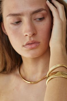 Discover the Elegance of Sustainable Jewelry . Our unique sustainable jewelry designs are not only ethically sourced and handcrafted, but they're also created with the modern woman in mind. Each piece is designed to make women feel beautiful, elegant, and powerful. Our craftsmen combine eco-friendly materials with unpa Yellow Gold Polished Brass Bracelets, Gold Brass Jewelry With Oyster Bracelet, Elegant Gold Hand Forged Bangle, Elegant Gold Hand Forged Bracelets, Elegant Hand Forged Gold Bangle, Elegant Hand Forged Gold Bracelets, Gold Oyster Bracelet In Brass, Gold Oyster Bracelet Made Of Brass, Polished Yellow Gold Brass Bangle