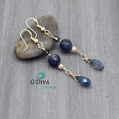 This beautiful and elegant earrings are created expertly by hand and inspired by the swirling colors of the ocean with natural dark blue gemstone sodalite, sparkling briolette and bicone crystals, made with sterling silver wire wrapped. Long and delicate briolette dangle earrings was designed to give you a sophisticated feminine look. These blue bead bohemian earrings is great for weddings or any special occasion. Perfect for a something blue gift ( Weddings) Total long each earring: 2.5" inches Blue Gemstone Beads Drop Earrings, Blue Gemstone Bead Drop Earrings, Elegant Sodalite Gemstone Jewelry, Blue Sterling Silver Earrings With Gemstone Beads, Elegant Lapis Lazuli Wire Wrapped Earrings, Elegant Wire Wrapped Lapis Lazuli Earrings, Blue Gemstone Beads Earrings For Gift, Earring Long, Blue Gemstone Earrings