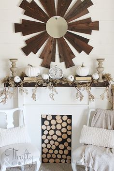 a living room filled with furniture and a large sunburst above the fire place