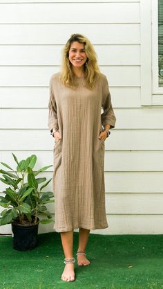 "* Bohemian Style Dress  * One Size Fits Most (US Women's S-3XL) * Organic Double Gauzed Cotton * 2 Side Pockets * Bust up to 50\" * Length 48\" * Coconut Button Back Closure * Suitable for any occasion * Great gift for yourself or your loved ones" Bohemian Long Sleeve Dress In Natural Fiber, Cotton Lagenlook Maxi Dress In Relaxed Fit, Cotton Lagenlook Maxi Dress With Relaxed Fit, Brown Cotton Lagenlook Dress, Beige Relaxed Fit Cotton Maxi Dress, Spring Cotton Maxi Dress With Natural Dye, Casual Long-sleeved Cotton Gauze Dress, Casual Cotton Gauze Long Sleeve Dress, Casual Long Sleeve Cotton Gauze Dress