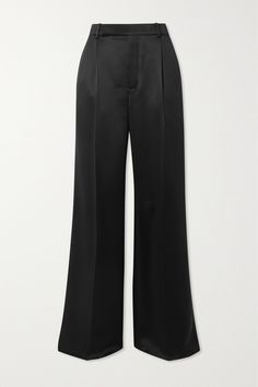 Exacting cuts and a commitment to luxurious fabrics make SAINT LAURENT's tailoring feel sophisticated. These straight-leg pants are made from fluid silk-satin and streamlined with pressed pleats. The unfinished hems sweep the floor, so reach for heeled sandals for a little elevation. Sleek Silk Wide Leg Pants, Sleek Silk High-waisted Wide Leg Pants, Sleek Wide-leg Silk Pants, Sleek Silk Wide-leg Pants, Luxury Satin Bottoms For Evening, Luxury Silk Wide Leg Pants For Evening, Luxury Satin Straight Pants, Luxury Satin Pants For Workwear, Luxury Satin Pants For Work