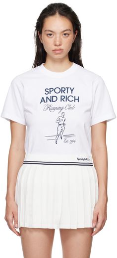 a woman wearing a white t - shirt with the slogan sporty and rich on it