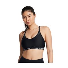 Get the support you need with the Under Armour� Crossback Low Sports Bra for Ladies. This Under Armour sports bra has an ultra-tight, second-skin fit with HeatGear� technology that ramps up the barely-there feel. The crossback strap design with adjustable fronts offers extra support, leaving you with a bra ideal for light-impact activities and all-day comfort. The removable cups offer enhanced shape and coverage. Strategically placed mesh panels in the front neckline and lower bust boost breathability. This bra features a deep V neckline and an exposed elastic bottom band with a logo wordmark. The fabric wicks away sweat, dries fast, and stays comfortable all day with odor control technology. 87% polyester/13% elastane. Machine wash. Imported. Manufacturer style #: 1386424.  87% polyester/ Blusas T Shirts, How To Make Shoes, Under Armour Women, Good Brands, Your Back, Second Skin, Bra Sizes, Custom Fit, Shapewear