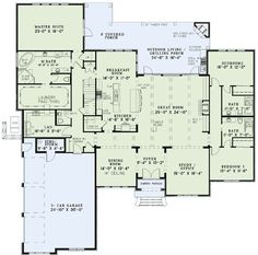 the first floor plan for a home with two master suites and an open kitchen area