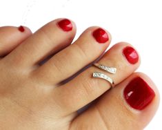 A best-seller. This comfortable 925 sterling ring wraps around and snugs against the toe. A really great look! One size fits all. Silver Anklets Designs, Small Earrings Gold, Ring Finger Nails, Ring Finger Tattoos, Sterling Silver Toe Rings, Anklet Designs, Ring Tattoos, Simulated Diamond Rings