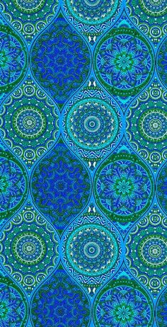 an abstract blue and green background with many circular designs on it's surface, including circles