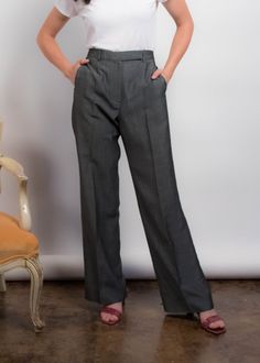 "Vintage 90s Kenzo wide-leg trousers. Great wide-leg silhouette trousers in a charcoal gray wool fabric. High-waisted. Band waist. Welt pockets. Pressed seam. Unlined. Front hook and eye and zipper fastening. We kindly ask that you please view all measurements for comparison so you can get your desired fit. Made in Paris. * Brand: Kenzo * Decade: 1990s * Fabric: 49% Viscose Rayon, 30% Wool, 21% Mohair Wool * Lining: Unlined * Color: Charcoal Gray C O N D I T I O N Excellent vintage condition, mi Classic Gray Wide Leg Pants For Work, Formal Gray Wide-leg Pants, Elegant Gray Wide Leg Pants, Elegant Gray Full-length Wide Leg Pants, Gray Fitted Wide Leg Pants For Business Casual, Gray High Waist Pants For Formal Occasion, Gray Wide Leg Pants For Formal Fall Occasions, Gray Formal Wide Leg Full Length Pants, Gray Wide Leg Dress Pants For Work