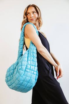 Whether for work, shopping, going to the gym, or traveling, this Large Carryall Quilted Puffer Bag for Women in Aqua is the perfect accessory. Featured with a puffer quilted design and many zipper pockets, this bag is not only practical for everyday use but also super trendy and stylish! Features: Do everything in love Style: QBS320125-AQUA Color: Aqua Blue 100% Polyester Featured with fashion puffer quilted design Interior zipper pocket Zipper pocket outside side Zipper close top Lightweight W: Puffer Bag, Do Everything In Love, Denim Tote Bags, Denim Tote, Aqua Color, Going To The Gym, Bag For Women, Matching Outfits, The Gym