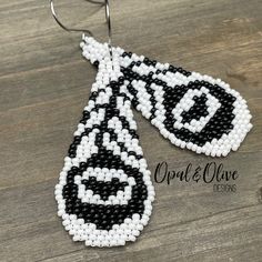 Carina beaded peacock teardrop earrings.   I named these earrings Carina which means beloved because peacocks are a symbol of love, passion and beauty.  White peacocks are the most rare, and really an amazing sight.  These earrings are handwoven, hand beaded, and intricately designed.  Woven with small Miyuki glass seed beads and strong nylon thread to last a lifetime.   Bead weaving is a time consuming art, each tiny bead is selected and hand sewn one at a time with a needle and thread.  So much love and care goes into each piece.   Lightweight and comfortable, these earrings are perfect to wear everyday, casual or dressy. Carina earrings measure 3 inches long by 1 inch wide.   Ear wires and wire guards are sterling silver. Elegant Teardrop Earrings With Colorful Beads, Traditional Teardrop Earrings As A Gift, Elegant Colorful Beaded Teardrop Dangle Earrings, Traditional Teardrop Earrings For Gift, Beaded Teardrop Earrings As Gift, Beaded Teardrop Earrings For Gift, Unique Handmade Teardrop Beaded Earrings, Gift Teardrop Earrings With Colorful Beads, Unique Beaded Teardrop Jewelry