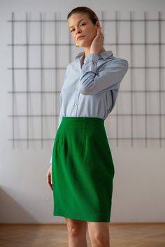 Buy 3 items and get 30% off your entire order. Limited offer. All orders are shipped via FedEx. Shipping to the US typically takes 2 to 3 business days, while within the EU, it takes 2 to 6 business days. Vintage 100% wool pencil skirt in bright grass green colour. It features high waist and above-the-knee length. Back zipper & button closure. Lined. Material: 100% wool Condition: great vintage condition Size: best fits size S (pinned at waist for fit, size on tag: 42) Please compare measurement Green Skirt For Spring Workwear, Green Knee-length Skirt For Formal Occasions, Spring Workwear Green Mini Skirt, Green Formal Skirt For Spring, Green Mini Skirt For Spring Office Wear, Green Knee-length Skirt For Workwear, Spring Office Green Mini Skirt, Green Spring Office Mini Skirt, Green Relaxed Skirt For Work