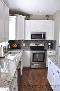 the kitchen is clean and ready for us to use it's stainless steel appliances