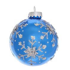 a blue christmas ornament with snowflakes on it