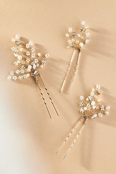 The Twigs & Honey Dainty Beaded Fern Leaf Hair Pins feature intricate beaded designs that capture the elegance of fern leaves, adding a whimsical and nature-inspired touch to any hairstyle. | Dainty Beaded Fern Leaf Hair Pins, Set of 3 by Twigs & Honey in Gold, Women's, Freshwater Pearl/Glass at Anthropologie Pearl Hair Clips, Hair Decor, Beaded Designs, Hair Brooch, Fern Leaves, Fern Leaf, Pearl Hair Clip, Wedding Party Jewelry, Pearl Hair