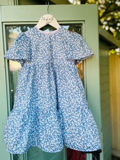 Hand made bespoke floral tiered dress for 3-4 years , perfect for spring/summer.  Liberty print cotton lawn fabric with satin polyester lining. Cute Tiered Dress For Garden Party, Blue Floral Print Tiered Dress, Blue Tiered Floral Print Dress, Blue Cotton Tiered Dress With Ruffle Hem, Blue Cotton Tiered Dress, Cotton Tiered Ruffle Dress For Garden Party, Spring Blue Cotton Tiered Dress, Blue Floral Print Tiered Skirt Dress, Spring Blue Tiered Dress