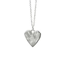 A necklace to honor the sweetness of your human heart. Smooth and polished with a slightly organic texture.   DETAILS Hand cast in sterling silver ½ inch by ½ inch. Choose 16, 18, or 20 inch sterling silver chain. Sterling Silver Hammered Necklaces For Anniversary, Hammered Sterling Silver Necklaces For Anniversary, Hammered Silver Heart Jewelry, Sterling Silver Hammered Necklace For Anniversary, Anniversary Sterling Silver Hammered Necklace, Heart-shaped Hammered Sterling Silver Jewelry, Minimalist Sterling Silver Charm Necklace With Large Pendant, Silver Sterling Silver Heart Necklace, Sterling Silver Clasp Pendant Necklace For Everyday