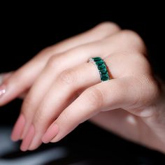 Product Details Offer a token of admiration with this exquisite band Ring. Featuring an Octagon Cut Lab Created Emerald in a shared prong setting on a Full Eternity Ring, it seamlessly pairs with wedding and eternity bands. With its minimalist design, this stunning Eternity Band is a must-have piece of jewelry for your elegant look. Product Information SKU SHP-RINGS102023335 Width 3.4 mm Height 5 mm Weight 2.60 gm (Approximate) LAB CREATED EMERALD INFORMATION No.of Stones 24 Pieces Total Weight 7.20 Carat (Approximate) Dimension(approx) Emerald Cut-3X5 mm-24 Pcs Color Green Cut Brilliant Shape Emerald Cut Setting Type Shared-Prong-Setting Quality Grade AAAA View More Product Parent Collection Handle lab-created-emerald-rings Emerald Eternity Band, Lab Created Emerald, Full Eternity Ring, Eternity Band Ring, Ring Sizer, Eternity Band, Emerald Ring, Eternity Bands, Yellow Gold Rings